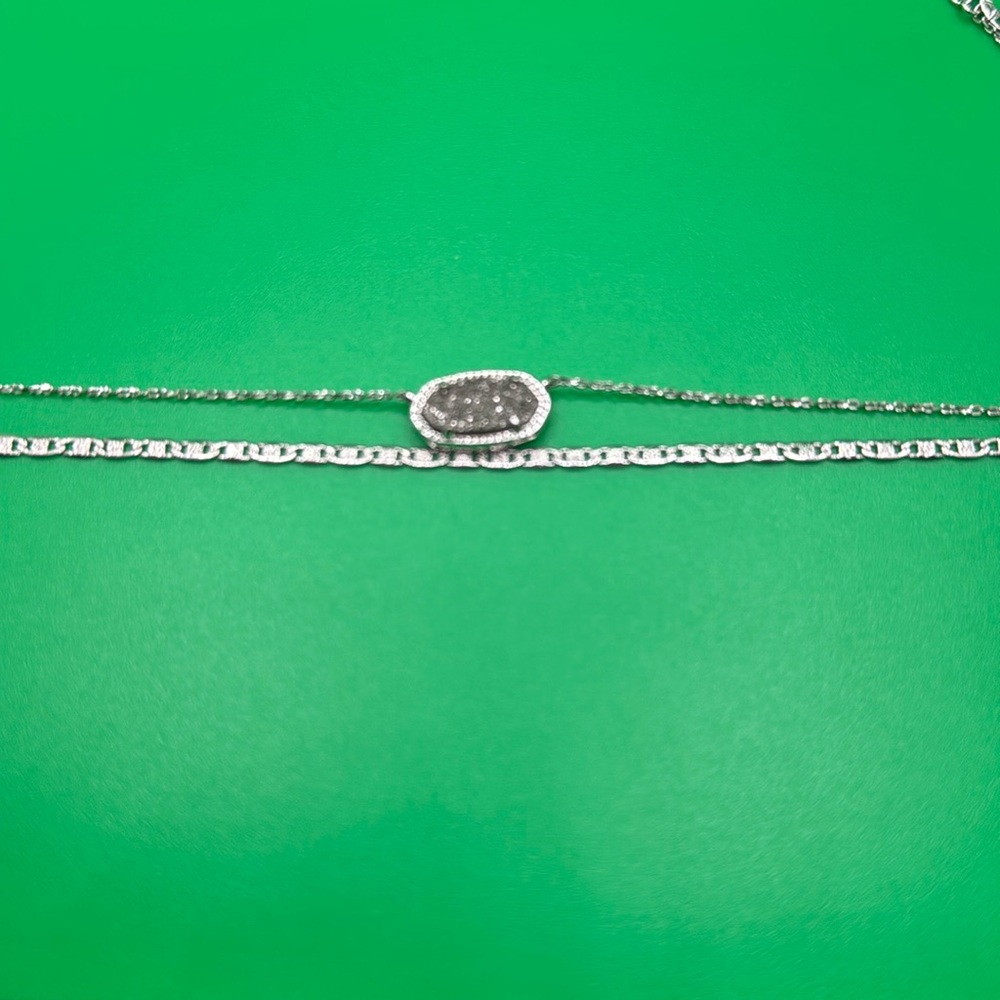 Kendra Scott layered necklace.